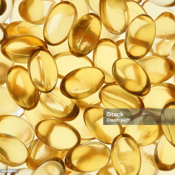 Goldengel Vitamin Omega 3 Fischöl Kapseln Stockfoto und mehr Bilder von Bildhintergrund - Bildhintergrund, Extreme Nahaufnahme, Fischöl