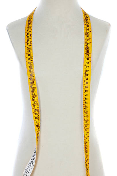 istock Mannequin with a tape measure 452806601