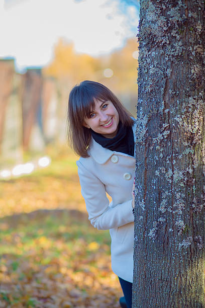 Girl in autumn Park stock photo