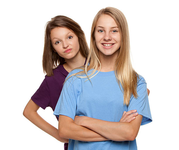 istock Two Teenage Friends Posing Together. 452849379