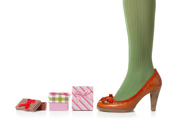 istock Woman legs and gift boxes 452963673