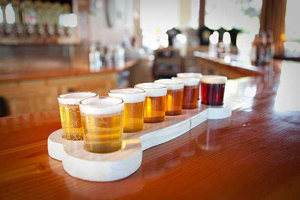 istock Small glasses of beer known as a taster. 452964553