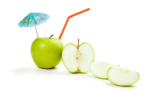 immagine di mela verde isolato su bianco - apple close up creativity drinking straw foto e immagini stock
