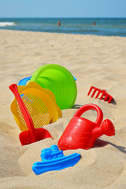 istock Plastic toys on the sea beach 452970181