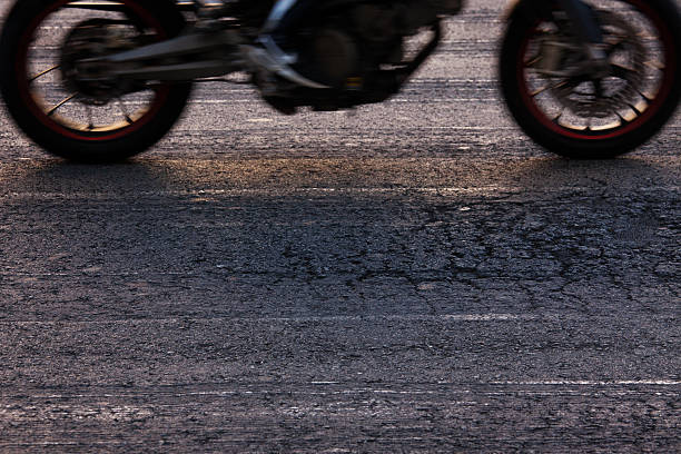 istock Rapidly riding a motorcycle on the road 452973277