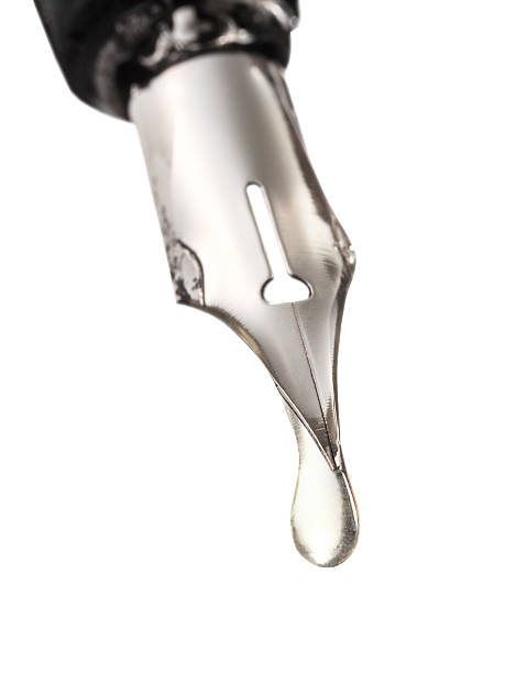 istock water drop dripping from nib of pen 452973351