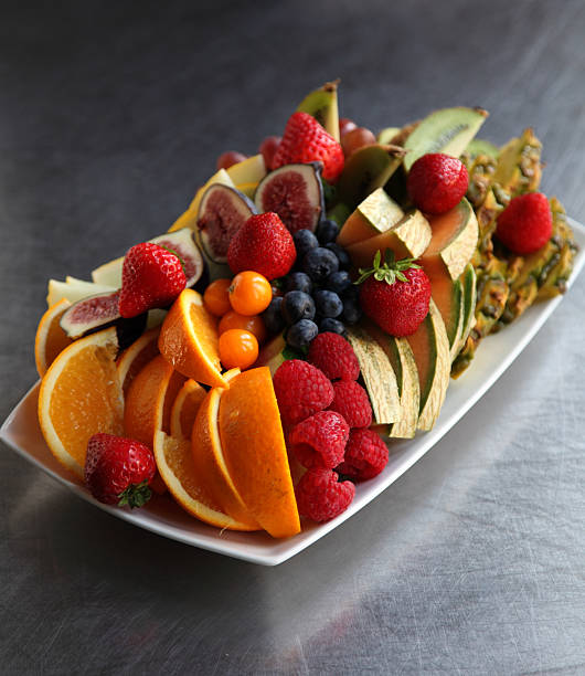 istock Selection of mixed sliced fruit 452973585