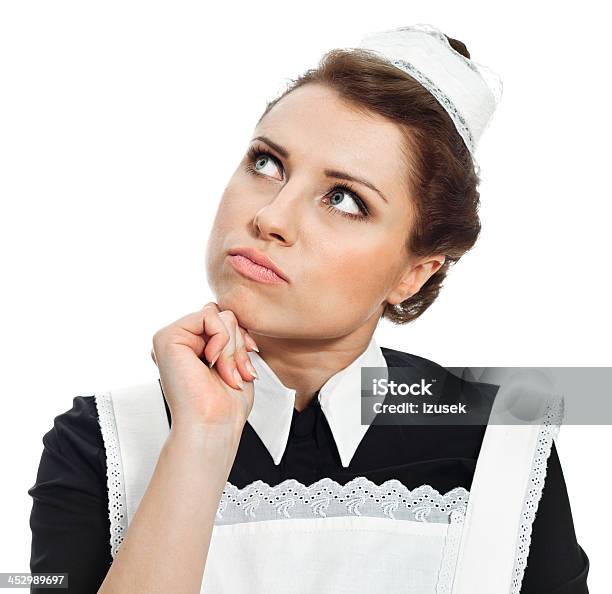 Retro Maid Making A Desicion Stock Photo - Download Image Now - 1920-1929, 20-29 Years, Adult
