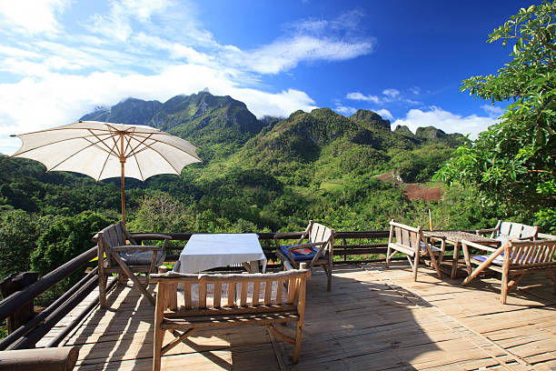 istock Beautiful mountain view from wooden balcony 452991837