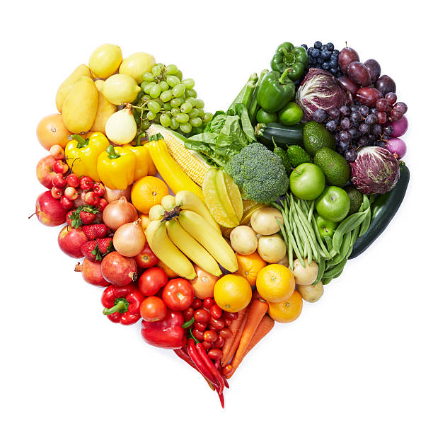 diferentes frutas y verduras formación de forma de corazón - arco iris fotos fotografías e imágenes de stock