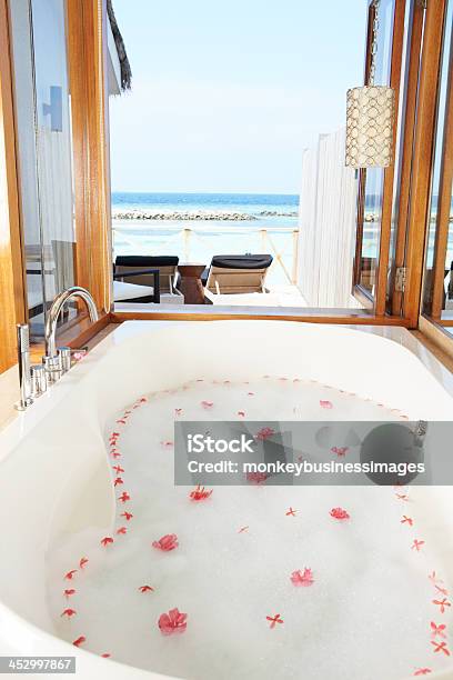 Luxury Hotel Bathroom With Ocean View Stock Photo - Download Image Now - Bathtub, Looking Through Window, Scenics - Nature