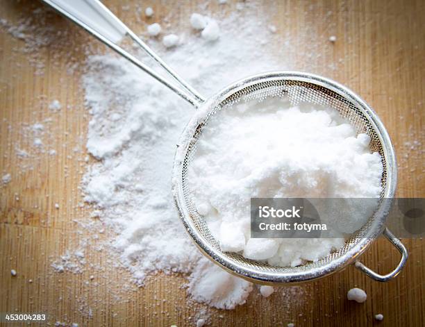 Powdered Sugar In A Sifter Ready For Dusting Stock Photo - Download Image Now - Powdered Sugar, Sieve, Baked