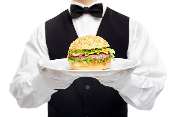 istock Waiter torso with hamburger on plate 453005825