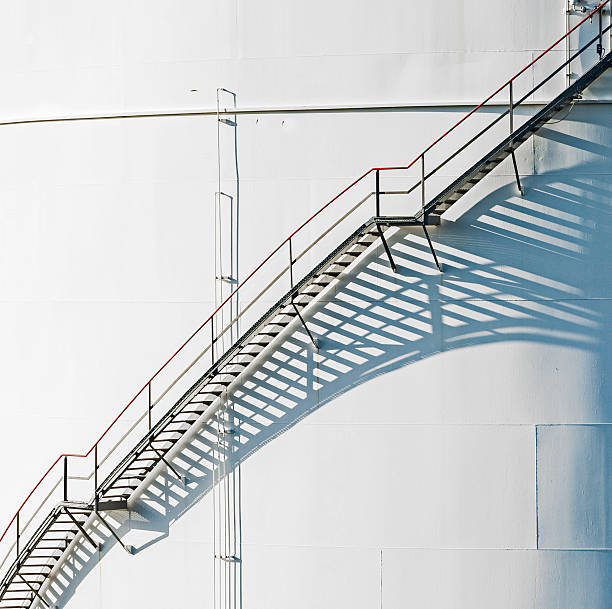 istock white tanks in tank farm with blue sky 453009287