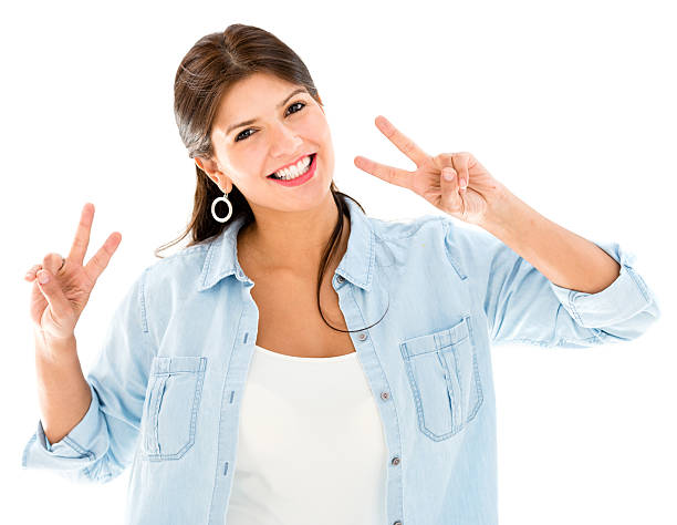 istock Woman making a peace sign 453010829