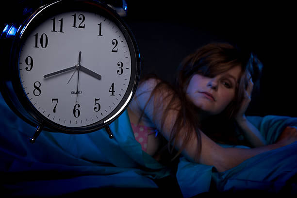 istock Young woman lying awake 453011313