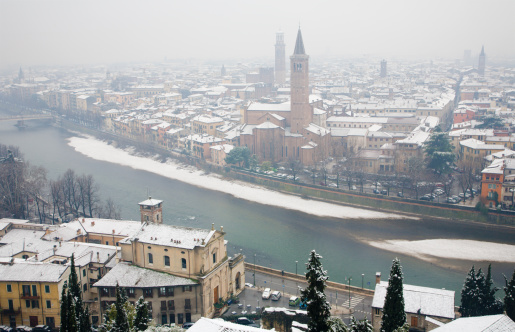 Verona is a city on the Adige River in Veneto, Italy, with 258,031 inhabitants. It is one of the seven provincial capitals of the region, and is the largest city municipality in the region and in northeastern Italy. It is one of the main tourist destinations in Northern Italy because of its artistic heritage and several annual fairs and shows as well as the opera season in the Arena, an ancient Roman amphitheater.\n\nTwo of William Shakespeare's plays are set in Verona: Romeo and Juliet (which also features Romeo's visit to Mantua) and The Two Gentlemen of Verona. It is unknown if Shakespeare ever visited Verona or Italy, but his plays have lured many visitors to Verona and surrounding cities. Verona was also the birthplace of Isotta Nogarola, who is said to be the first major female humanist and one of the most important humanists of the Renaissance. In November 2000 the city was declared a World Heritage Site by UNESCO because of its urban structure and architecture.