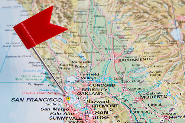 Destination: San Francisco A red pushpin pinpointing the City and County of San Francisco on a map. contra costa county stock pictures, royalty-free photos & images