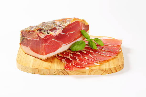 sliced prosciutto stock photo