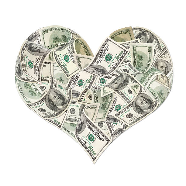 istock Heart sign made by 100 dollar banknotes 453025177
