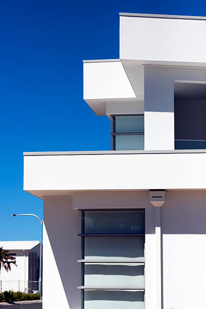 istock Closeup modern house in sunlight against blue sky, copy space 453033657