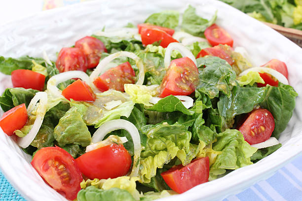 istock fresh green salad with tomatoes 453037279
