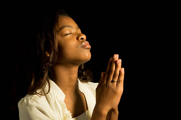 istock Praying African American Teen 453044575