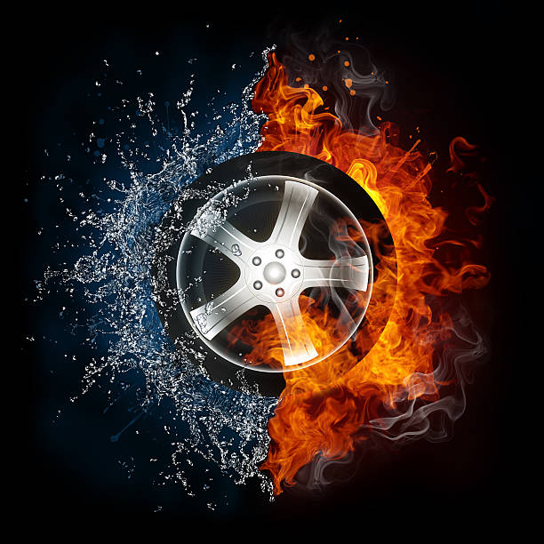 Disc brakes burn with high temperature and the smoke of racing cars on the racetrack at night