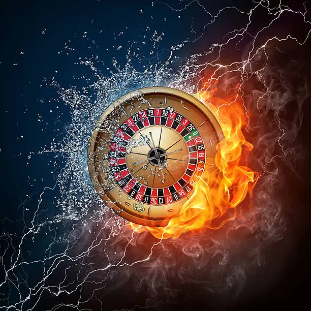 Casino Roulette in Water and Fire on Black Background.