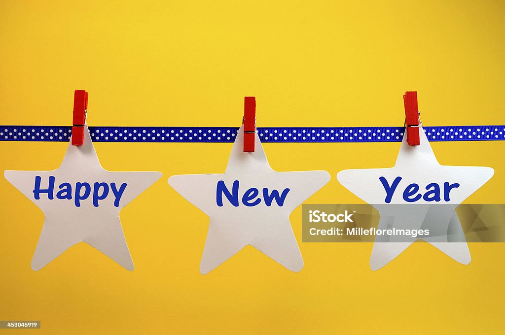 Feliz Ano Novo-saudação PEG sobre uma linha - Royalty-free Amarelo Foto de stock