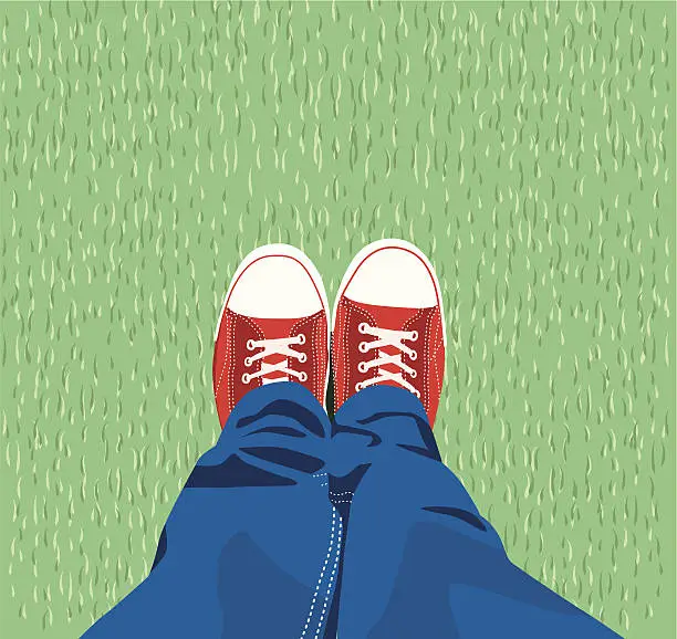 Vector illustration of Sneakers on the grass