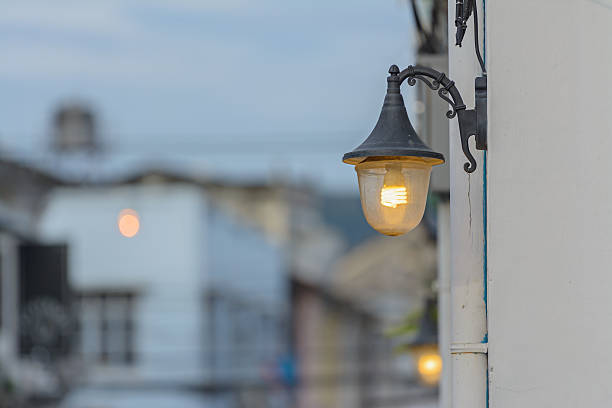 istock Street lamps on the building front 453057245