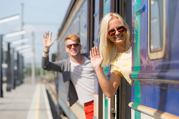 istock Couple Leaving for Vacation with Train 453057923