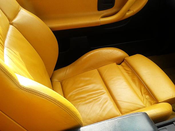 istock Yellow sport shaped leather vehicle seat 453058575