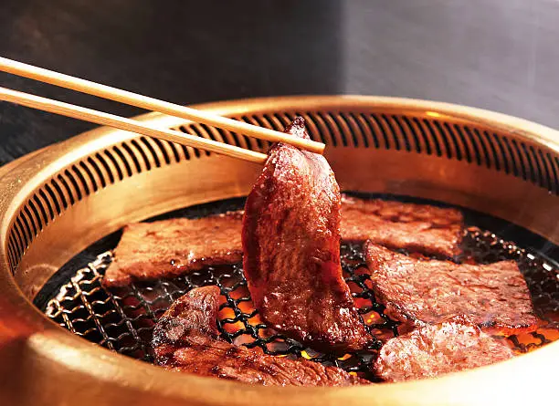 It is japanese yakiniku. It is a place where it pinches with chopsticks and it turns over. food