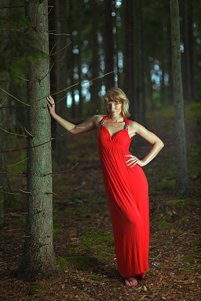 istock Beautiful young woman in the forest 453061119