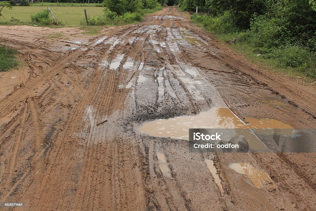 gravel road gravel road in upcountry too inferior in rains Abstract Stock Photo