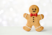 An iced gingerbread man on white