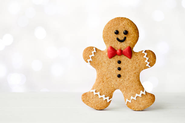 An iced gingerbread man on white stock photo