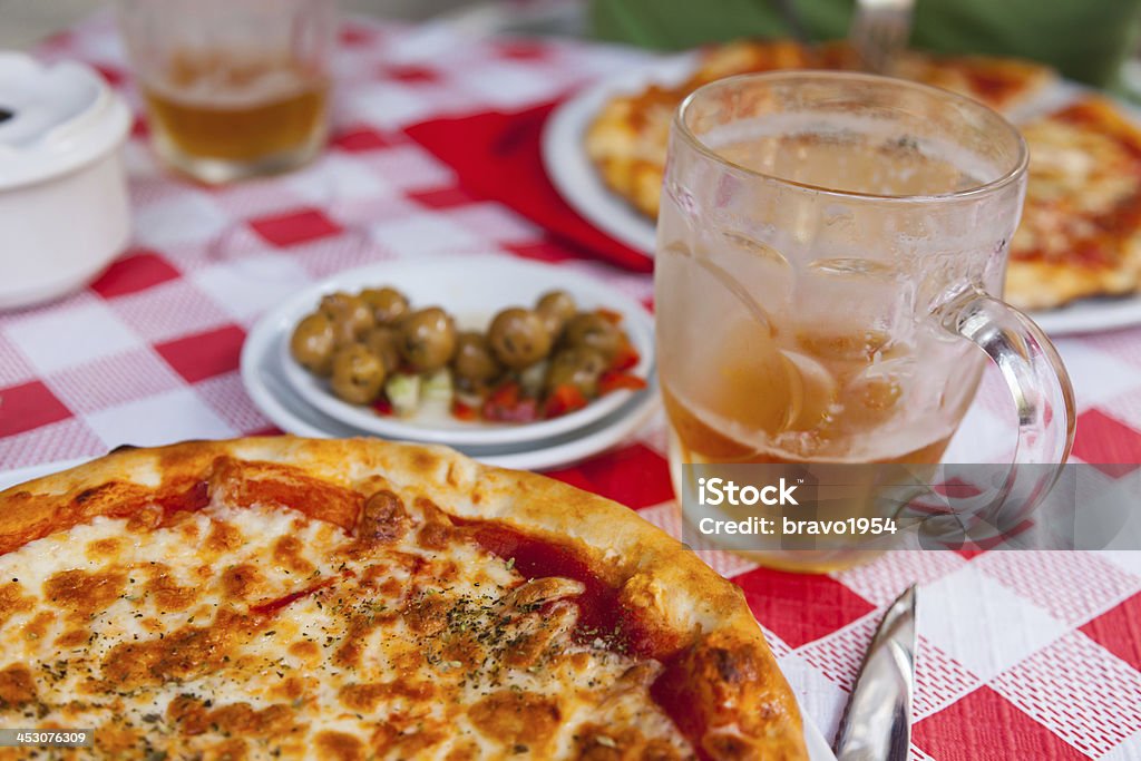 Pizza In restaurant Cheese Stock Photo