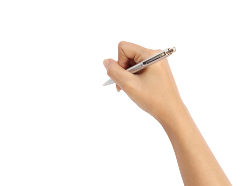 hand with pen writing on white background (with clipping path)