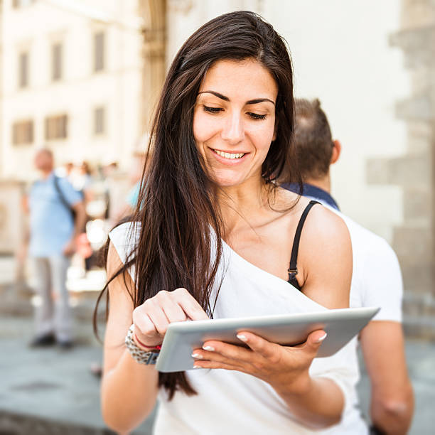 istock social networking with tablet in the city 453081571