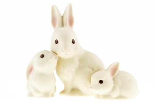 Chocolate Easter bunny and chocolate eggs on a white background