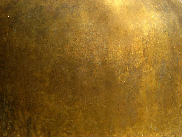 bronze metall textur - textured industry yellow abstract stock-fotos und bilder