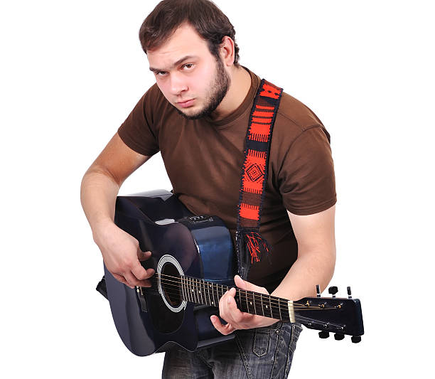 istock man musician playing his guitar 453090511