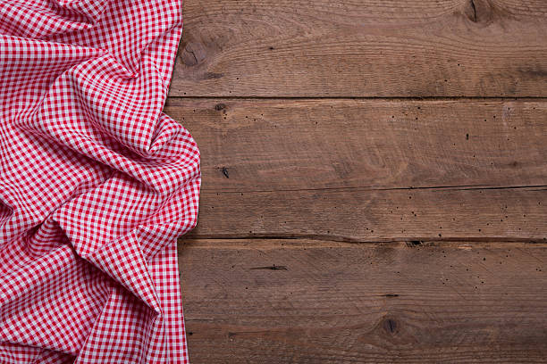 istock Checkered fabric as border on wooden background for christmas. 453095949
