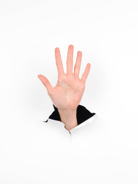 istock hand counting number five gesture, paper with hole 453102909