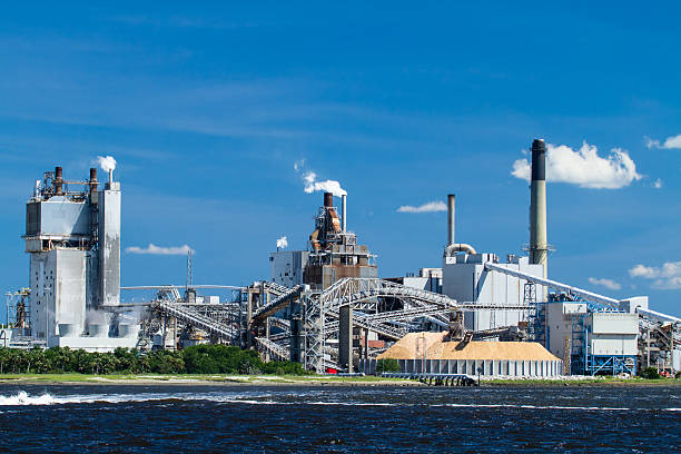 istock Industrial Paper Mill on a River 453104221