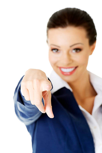 istock Young business woman pointing on you. 453105487