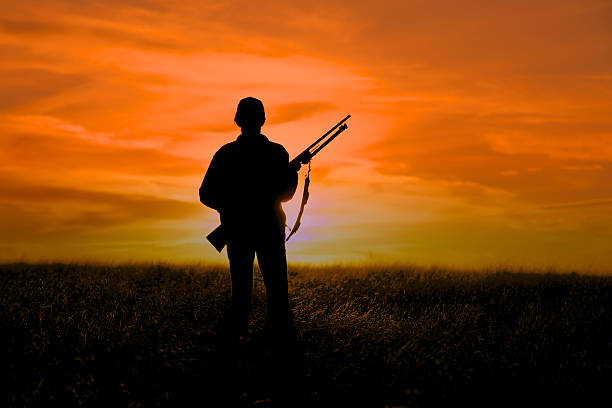 istock Woman Hunter in Sunset 453114325